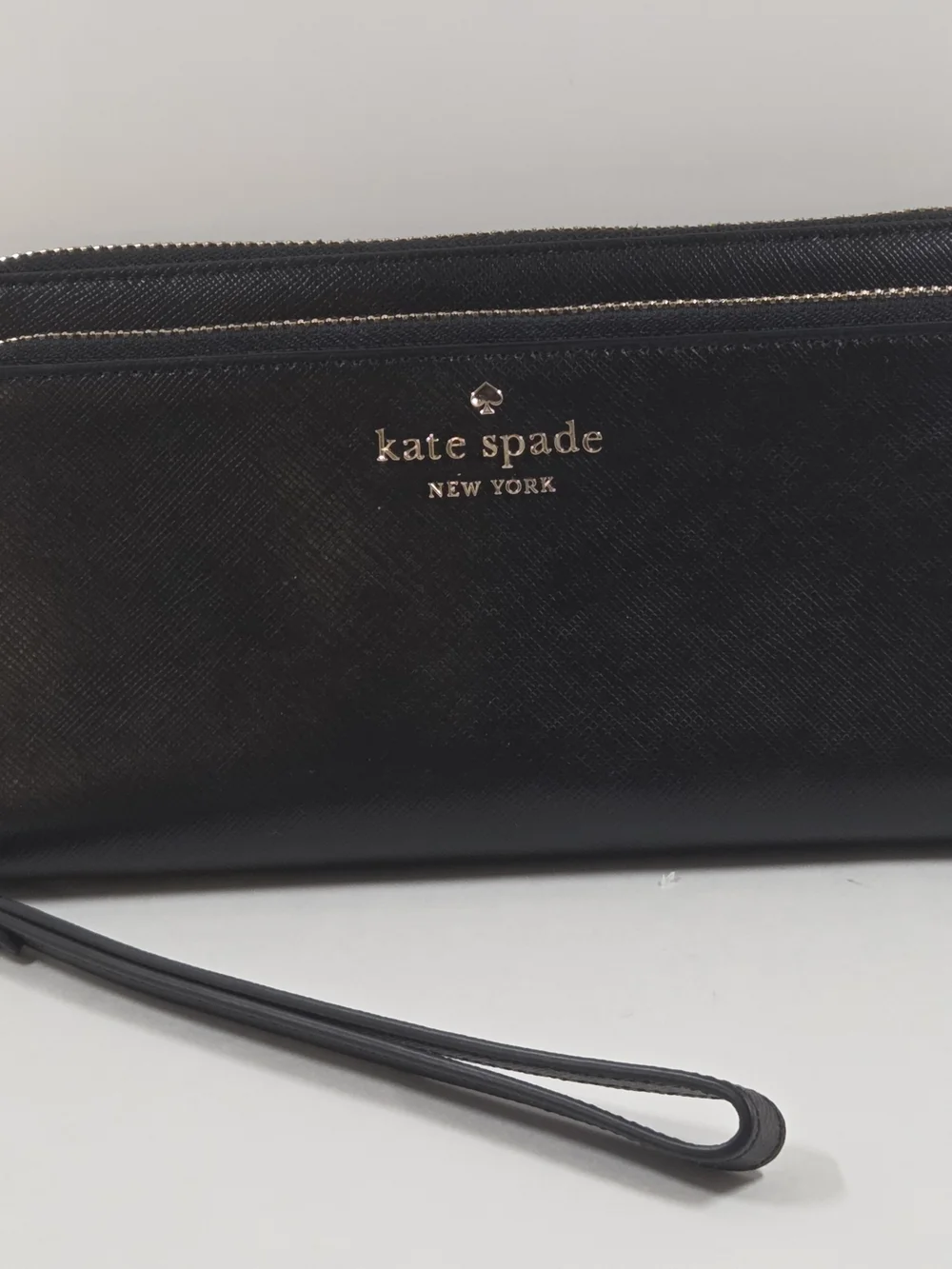 kate spade New York Black Saffiano Wristlet with Gold Logo